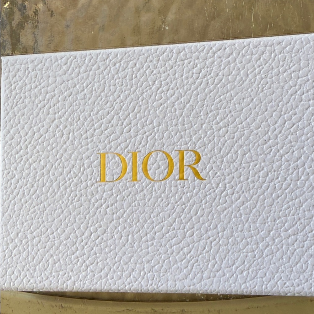 Dior Textured White and Gold Cover